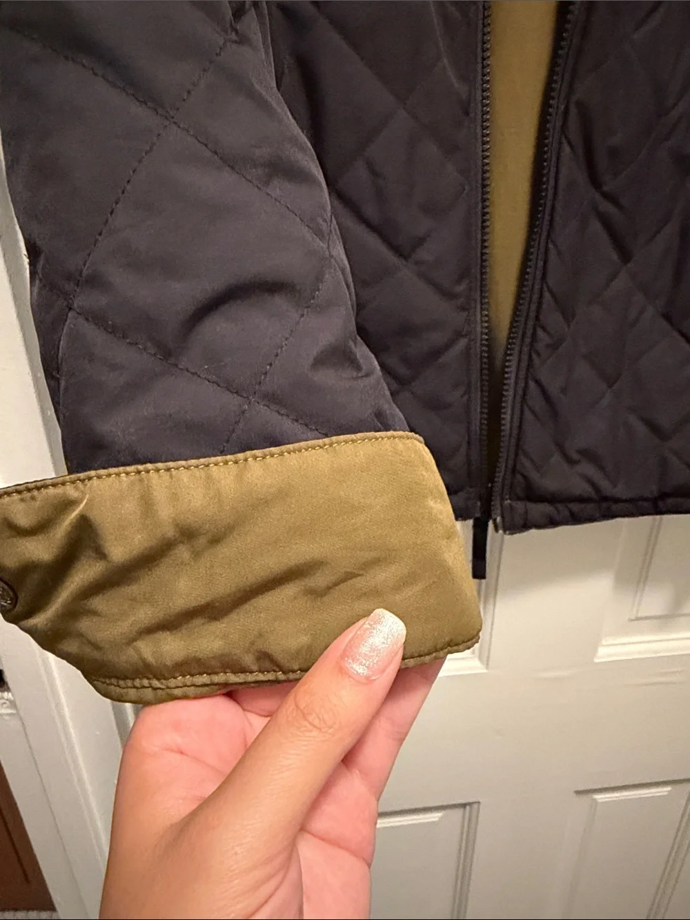 The North Face Men's reversible Black Bomber Jacket with Olive Interior M